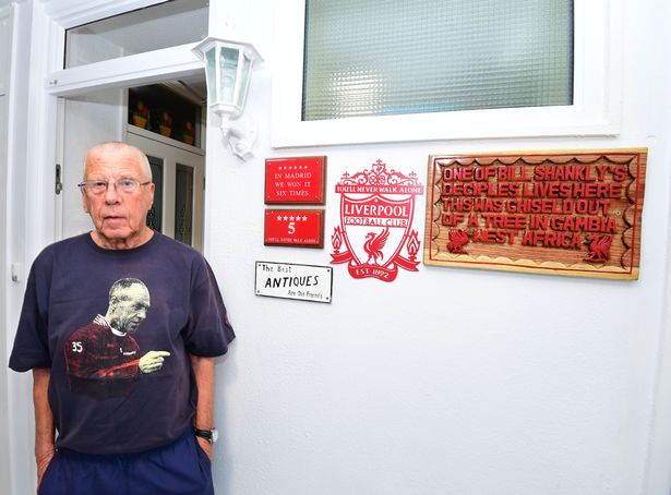 Ernie has been told to take down the wooden Bill Shankly tribute plaque from outside his home