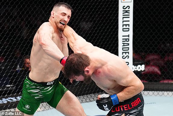 MONTREAL, QUEBEC - MAY 10: (R-L) Ion Cutelaba of Moldova and Modestas Bukauskas of Lithuania trade punches in a light heavyweight bout during the UFC 315 event at Bell Centre on May 10, 2025 in Montreal, Quebec. (Photo by Chris Unger/Zuffa LLC)