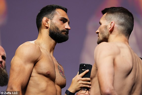 MONTREAL, QUEBEC - MAY 09: (L-R) Benoit Saint Denis of France and Kyle Prepolec of Canada face off during the UFC 315 ceremonial weigh-in at Bell Centre on May 09, 2025 in Montreal, Quebec.  (Photo by Cooper Neill/Zuffa LLC)