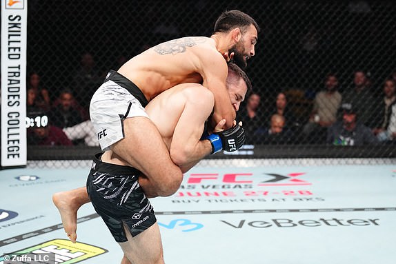 MONTREAL, QUEBEC - MAY 10: (L-R) Benoit Saint Denis of France works for a submission against Kyle Prepolec of Canada in a lightweight bout during the UFC 315 event at Bell Centre on May 10, 2025 in Montreal, Quebec. (Photo by Chris Unger/Zuffa LLC)