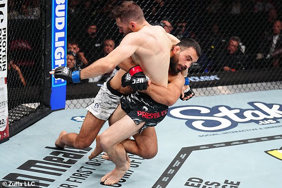 MONTREAL, QUEBEC - MAY 10: (L-R) Benoit Saint Denis of France takes down Kyle Prepolec of Canada in a lightweight bout during the UFC 315 event at Bell Centre on May 10, 2025 in Montreal, Quebec. (Photo by Chris Unger/Zuffa LLC)