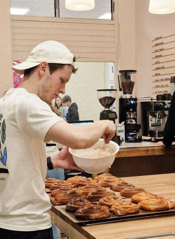 Benjamin preparing pastries at the bakery