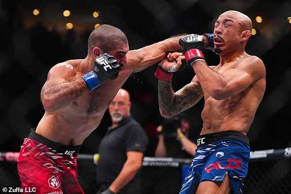 MONTREAL, QUEBEC - MAY 10: (L-R) Aiemann Zahabi of Canada punches Jose Aldo of Brazil in a featherweight bout during the UFC 315 event at Bell Centre on May 10, 2025 in Montreal, Quebec. (Photo by Cooper Neill/Zuffa LLC)