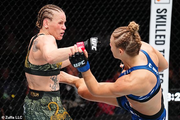 MONTREAL, QUEBEC - MAY 10: (L-R) Valentina Shevchenko of Kyrgyzstan trades strikes with Manon Fiorot of France in the UFC flyweight championship bout during the UFC 315 event at Bell Centre on May 10, 2025 in Montreal, Quebec. (Photo by Chris Unger/Zuffa LLC)