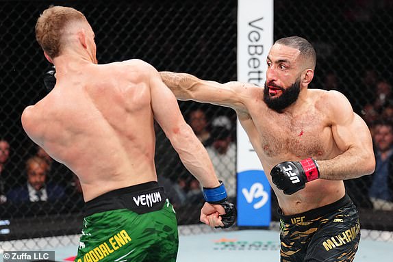 MONTREAL, QUEBEC - MAY 10: (R-) Belal Muhammad punches Jack Della Maddalena of Australia in the UFC welterweight championship bout during the UFC 315 event at Bell Centre on May 10, 2025 in Montreal, Quebec. (Photo by Chris Unger/Zuffa LLC)