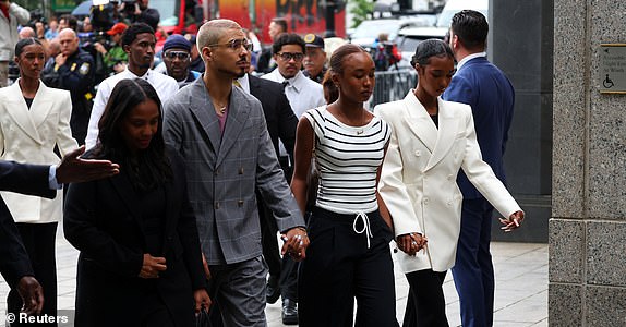 Family members of Sean Combs arrive at court for Sean "Diddy" Combs sex trafficking and racketeering conspiracy trial at U.S. court in Manhattan, in New York City, U.S., May 13, 2025. REUTERS/Mike Segar