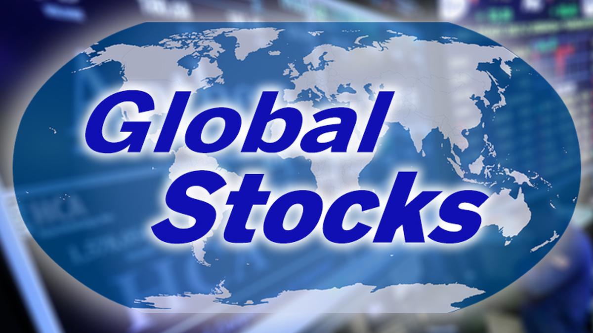 Stocks drift, dollar wobbles as markets bide time ahead of US data