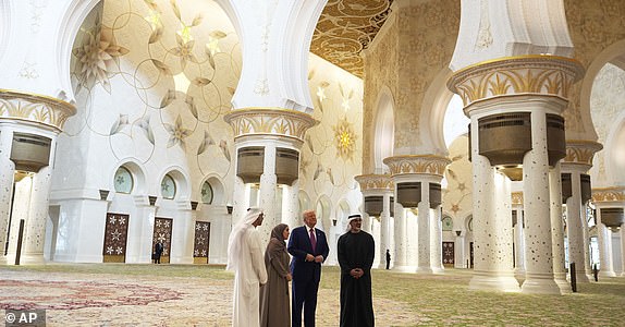 President Donald Trump and UAE President Mohammed bin Zayed Al Nahyan, right, tour the Sheikh Zayed Grand Mosque, Thursday, May 15, 2025, in Abu Dhabi, United Arab Emirates. (AP Photo/Alex Brandon)