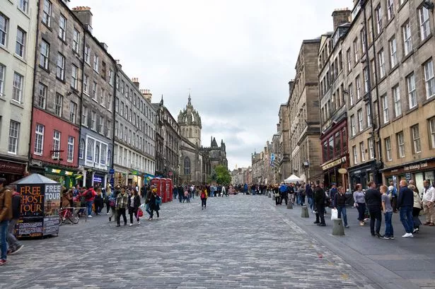 A picture of people walking on the Royal Mile