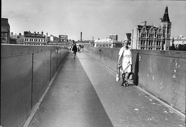 Roe Street, Walkway, Sky Bridge, Liverpool, Picture shows pedestrians using the walkway, also known as the sky bridge, in Roe Street, Liverpool City Centre. October 12, 1981