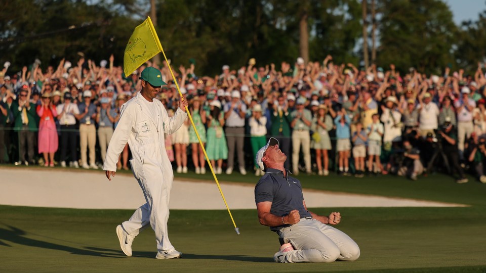McIlroy dropped to his knee after beating Justin Rose in a playoff to claim the Masters title