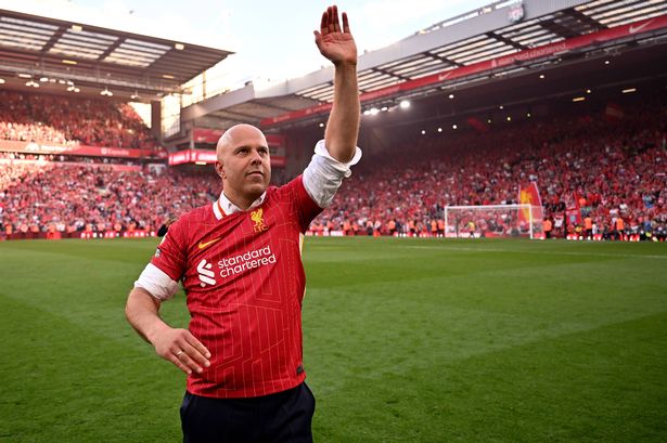 Arne Slot head coach of Liverpool celebrating after being named Champions of the Premier League at the end of the Premier League match between Liverpool FC and Tottenham Hotspur FC at Anfield on April 27, 2025