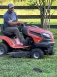 Man Hits Brakes On Lawnmower When He Realizes Wild Groundhog Is Following Him