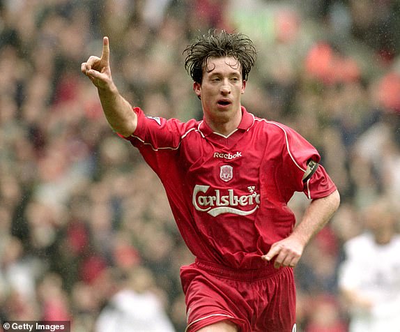31 Mar 2001:  Robbie Fowler of Liverpool celebrates scoring the second goal during the FA Carling Premiership match against Manchester United played at Anfield, in Liverpool, England. Liverpool won the match 2-0. \\ Mandatory Credit: Michael Steele /Allsport