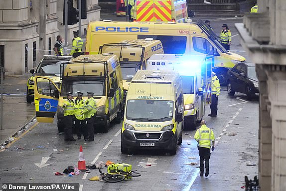 Police and emergency personnel dealing with a road traffic accident on Water Street near the Liver Building in Liverpool after a car collided with pedestrians during the Premier League winners parade. A man has been detained. Picture date: Monday May 26, 2025. PA Photo. See PA story POLICE Liverpool. Photo credit should read: Danny Lawson/PA Wire