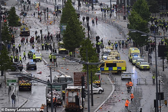 Police and emergency personnel dealing with a road traffic accident on Water Street near the Liver Building in Liverpool after a car collided with pedestrians during the Premier League winners parade. A man has been detained Picture date: Monday May 26, 2025. PA Photo. See PA story POLICE Liverpool. Photo credit should read: Danny Lawson/PA Wire