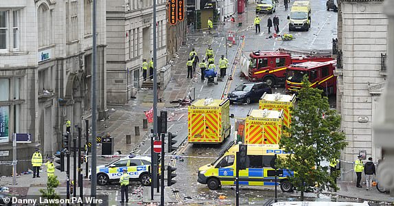 Police and emergency personnel dealing with a road traffic accident on Water Street near the Liver Building in Liverpool after a car collided with pedestrians during the Premier League winners parade. A man has been detained. Picture date: Monday May 26, 2025. PA Photo. See PA story POLICE Liverpool. Photo credit should read: Danny Lawson/PA Wire