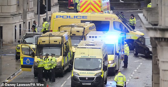 Police and emergency personnel dealing with a road traffic accident on Water Street near the Liver Building in Liverpool after a car collided with pedestrians during the Premier League winners parade. A man has been detained. Picture date: Monday May 26, 2025. PA Photo. See PA story POLICE Liverpool. Photo credit should read: Danny Lawson/PA Wire