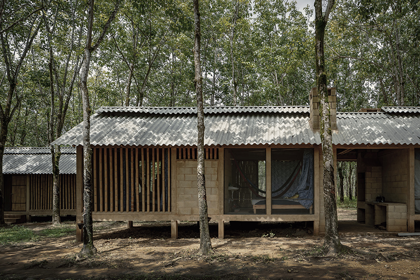 manuel cervantes estudio embeds temporary housing units among rubber trees in mexico