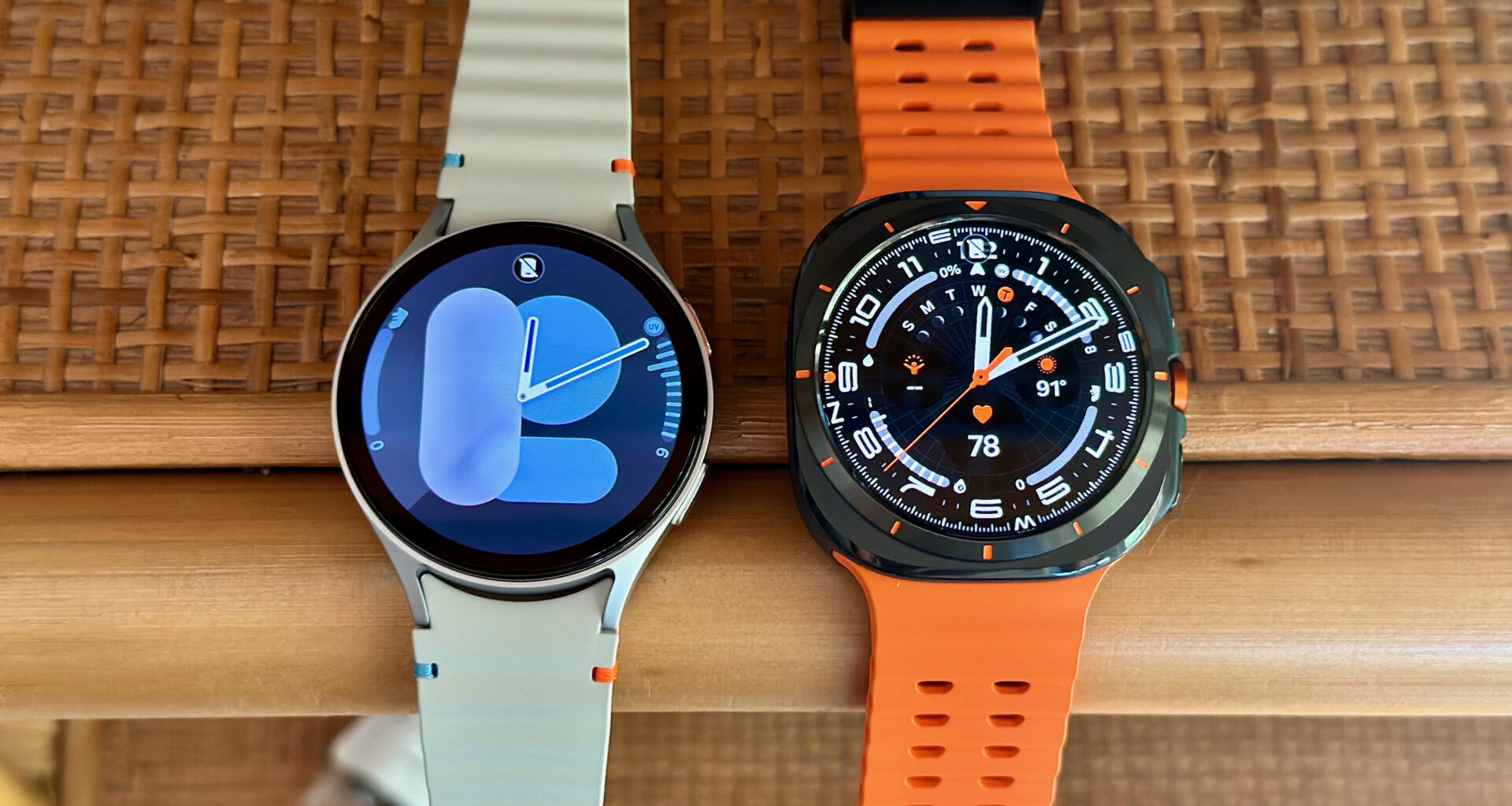 The Samsung Galaxy Watch 7 (left, silver) and Samsung Galaxy Watch Ultra (right, black) side-by-side