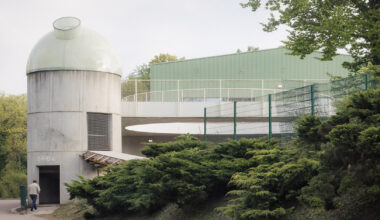 label tops sports center walkway with translucent dome in belgium