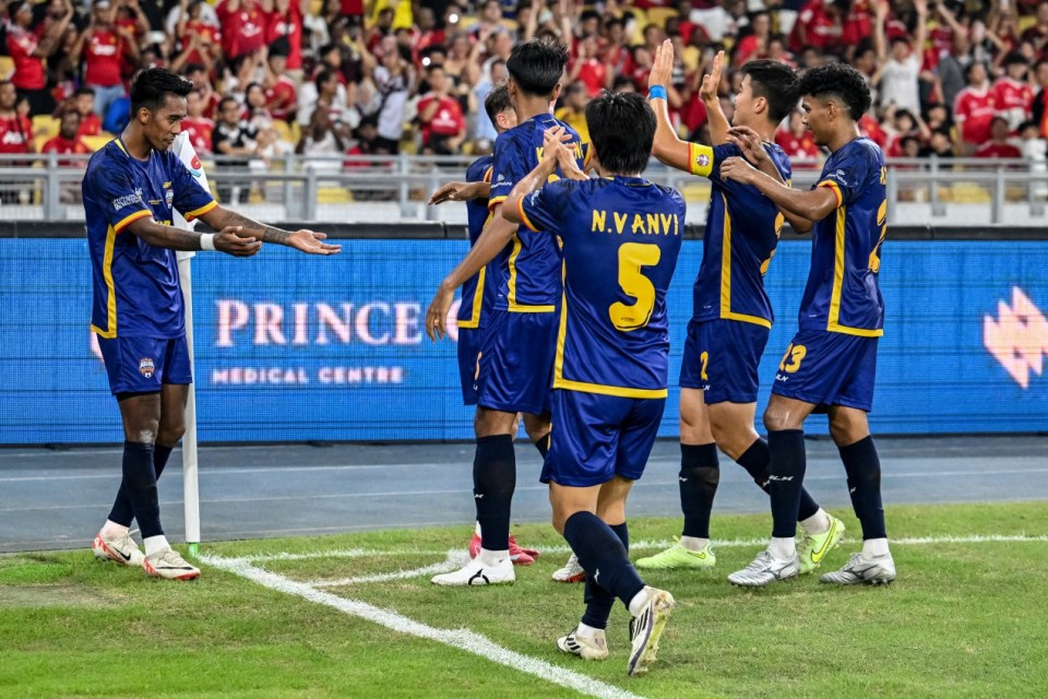 All-Stars Maung Maung Lwin (L) celebrates with teammates after scoring a goal during the exhibition friendly football match between Manchester United and Asean All-Stars at the National Stadium Bukit Jalil in Kuala Lumpur on May 28, 2025. (Photo by Mohd RASFAN / AFP) (Photo by MOHD RASFAN/AFP via Getty Images)