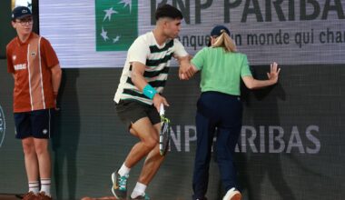 Carlos Alcaraz falls on line judge after colliding with French Open advert board