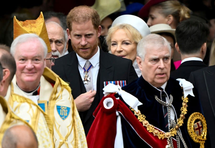 Britain’s Prince Harry, Duke of Sussex, and Prince Andrew leave Westminster Abbey following the coronation ceremony of Britain’s King Charles and Queen Camilla, in London, Saturday, May 6, 2023. (Toby Melville, Pool via AP)