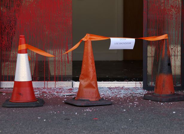 Smashed glass could be seen outside the office