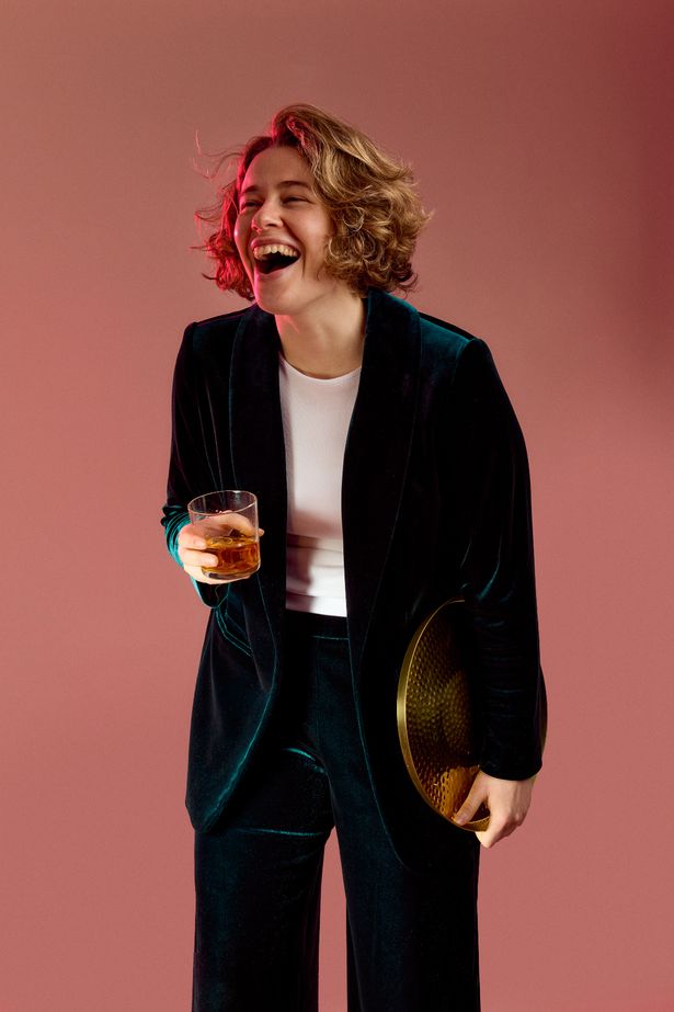 'I wanted to expand on that feeling of creating a lesbian bar,' Holly says of the idea behind her show