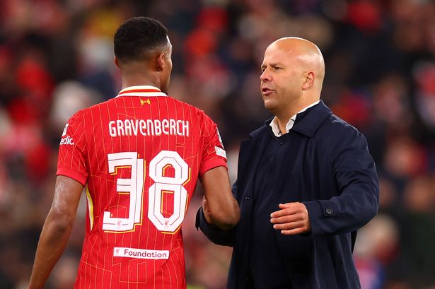 LIVERPOOL, ENGLAND - NOVEMBER 27: Ryan Gravenberch of Liverpool is congratulated by manager Arne Slot following the UEFA Champions League 2024/25 League Phase MD5 match between Liverpool FC and Real Madrid C.F. at Anfield on November 27, 2024 in Liverpool, England. (Photo by Chris Brunskill/Fantasista/Getty Images)