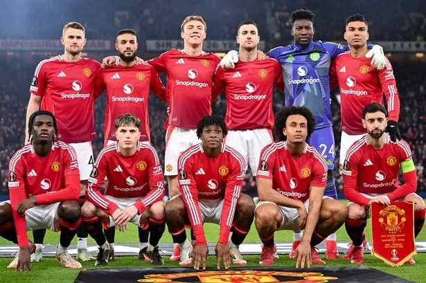 Manchester United's players pose for an official line-up photo ahead of a Europa League game at Old Trafford.