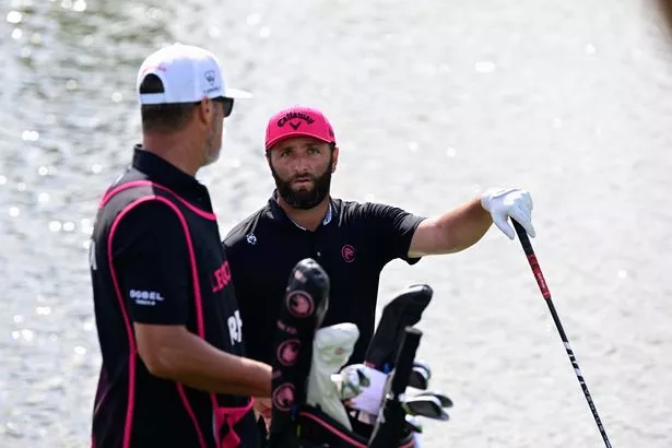 Jon Rahm, waits his turn to putt on the 18th hole, during  LIV Golf Miami on April 06, 2025, at Trump National Doral in Doral, FL.