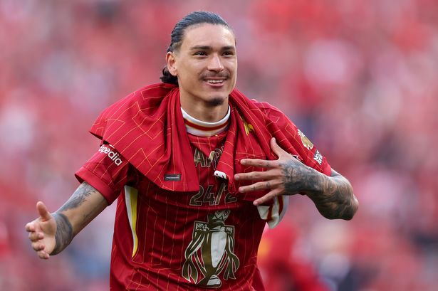 LIVERPOOL, ENGLAND - APRIL 27: Darwin Nunez of Liverpool celebrates the teams victory and confirmation of winning the Premier League title after the Premier League match between Liverpool FC and Tottenham Hotspur FC at Anfield on April 27, 2025 in Liverpool, England. (Photo by Carl Recine/Getty Images)