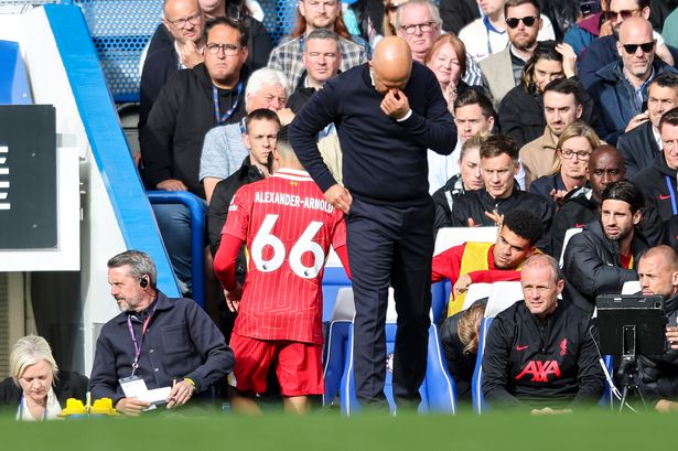 LONDON, ENGLAND - MAY 04: Head Coach Arne Slot substitutes Trent Alexander-Arnold of Liverpool during the Premier League match between Chelsea FC and Liverpool FC at Stamford Bridge on May 04, 2025 in London, England. (Photo by Robin Jones/Getty Images)