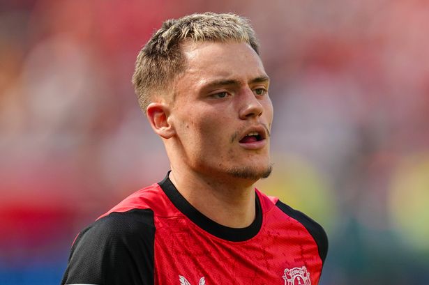 Florian Wirtz of Bayer 04 Leverkusen looks on