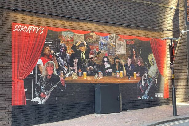 The new mural outside Scruffy Murphy's showing rock stars