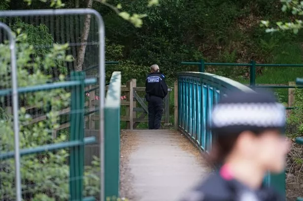 Police on Nuttall Lane in Ramsbottom after a man was found dead in the River Irwell