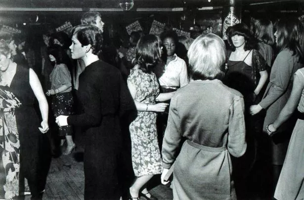1980s haircuts and style in full effect on the dancefloor at Cagneys nightclub
