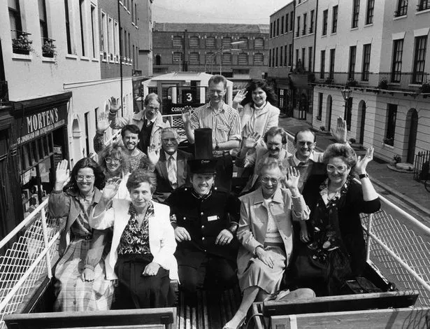 Granada Studios Tour winners enjoy a ride on the tram down Baker Street. Pictured L-R clockwise: Miss Kim Lord of Burnage, Sybil Wallman of Salford, Miss Margaret Fleet of Cholton, Kevin Fleming of Stretford, David Hurst of Wigan, Christopher Hollinghurst of Middleton, Nigel Morris of Warrington, Stewart Howarth of Denton, Majorie Stone of Manchester and Jean O'Sullivan of Whitefield. July 19, 1988