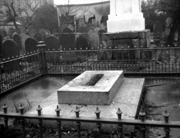 The partially removed tomb of John Dalton, Ardwick Cemetery, Manchester, 1961