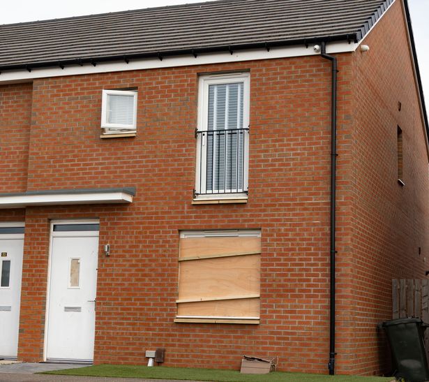 Windows boarded up on another property targeted on Saturday