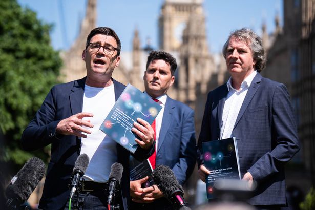 (left to right) Andy Burnham, Mayor of Greater Manchester, Huw Merriman, Chair of the Liverpool-Manchester Railway Partnership Board and Steve Rotheram, Mayor of the Liverpool City Region, speak to the media on College Green in Westminster, London, as they call on the government to include the Liverpool-Manchester Railway project in its 10-Year Infrastructure Strategy. Picture date: Wednesday May 14, 2025. PA Photo. Photo credit should read: James Manning/PA Wire