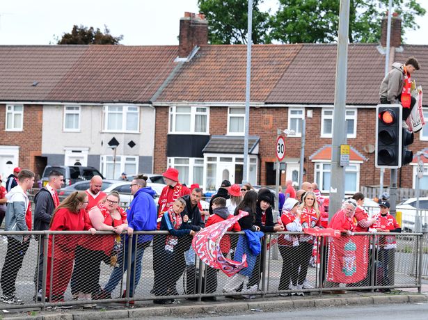 Liverpool fans waiting for the Parade to start on Queens Drive, Old Swan