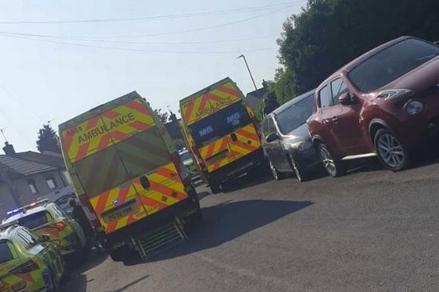 Police at the scene on Johnson Road, Prescot this afternoon