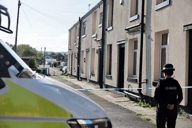 Police on East Street, Rochdale, amid a counter-terrorism operation