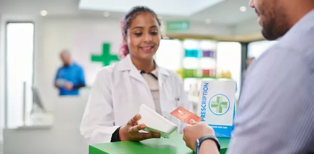 Pharmacist helping a patient