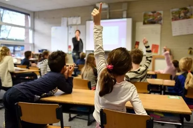 Stock image of schoolchildren in class