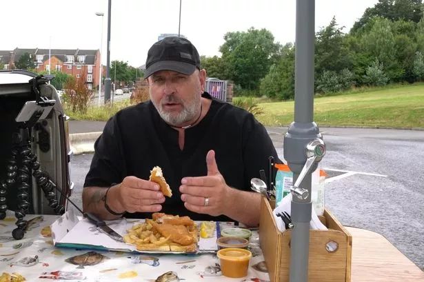 Stephen reviewing food from his favourite Liverpool chippy