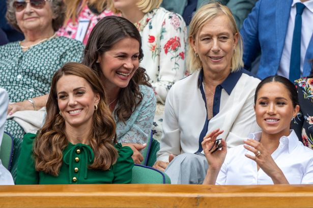 LONDON, ENGLAND - July 13:   Catherine, Duchess of Cambridge and Meghan, Duchess of Sussex in the Royal Box on Centre Court talking with Martina Navratilova and her spouse Julia Lemigova during the Serena Williams of the United States match against Simona Halep of Romania during the Ladies Singles Final on Centre Court during the Wimbledon Lawn Tennis Championships at the All England Lawn Tennis and Croquet Club at Wimbledon on July 13, 2019 in London, England. (Photo by Tim Clayton/Corbis via Getty Images)